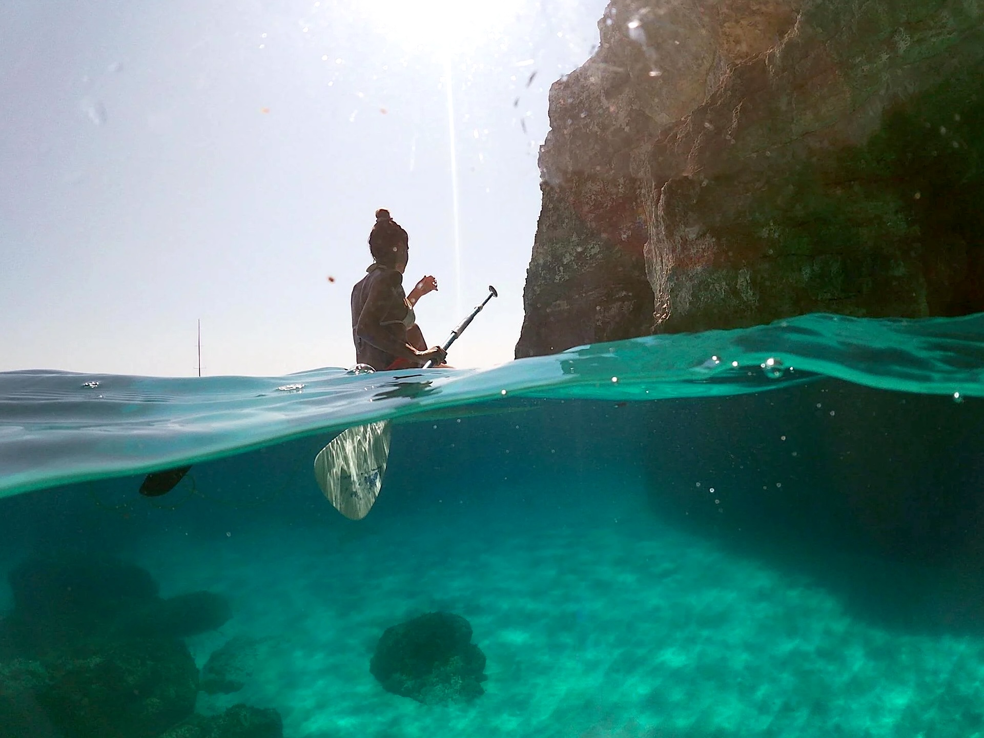 Stand up paddle at Mellieħa Bay seen from the water