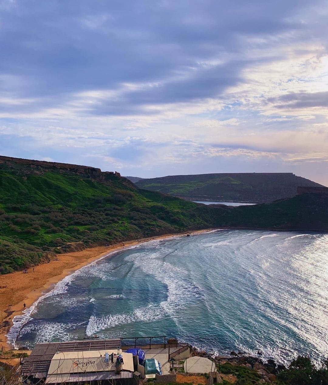 Riviera Beach Ochre sand of Riviera Beach (Għajn Tuffieħa) backed by cliffs