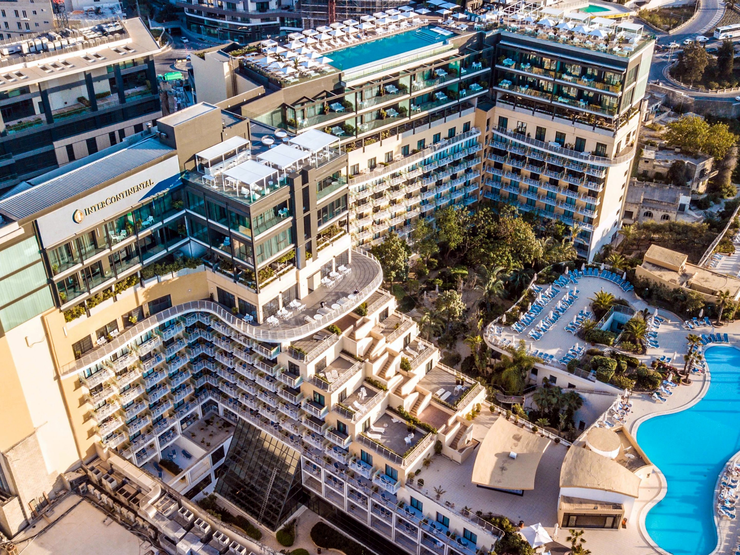 Aerial view of the InterContinental Malta, its towers and lagoon pool in St Julian’s