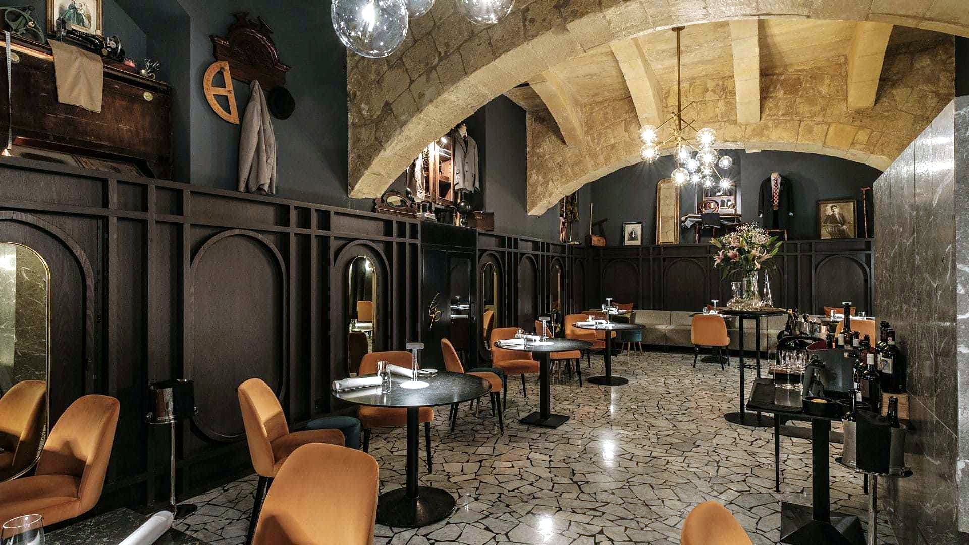 Sala in pietra a volta del ristorante stellato Under Grain, nel seminterrato del Rosselli AX Privilege