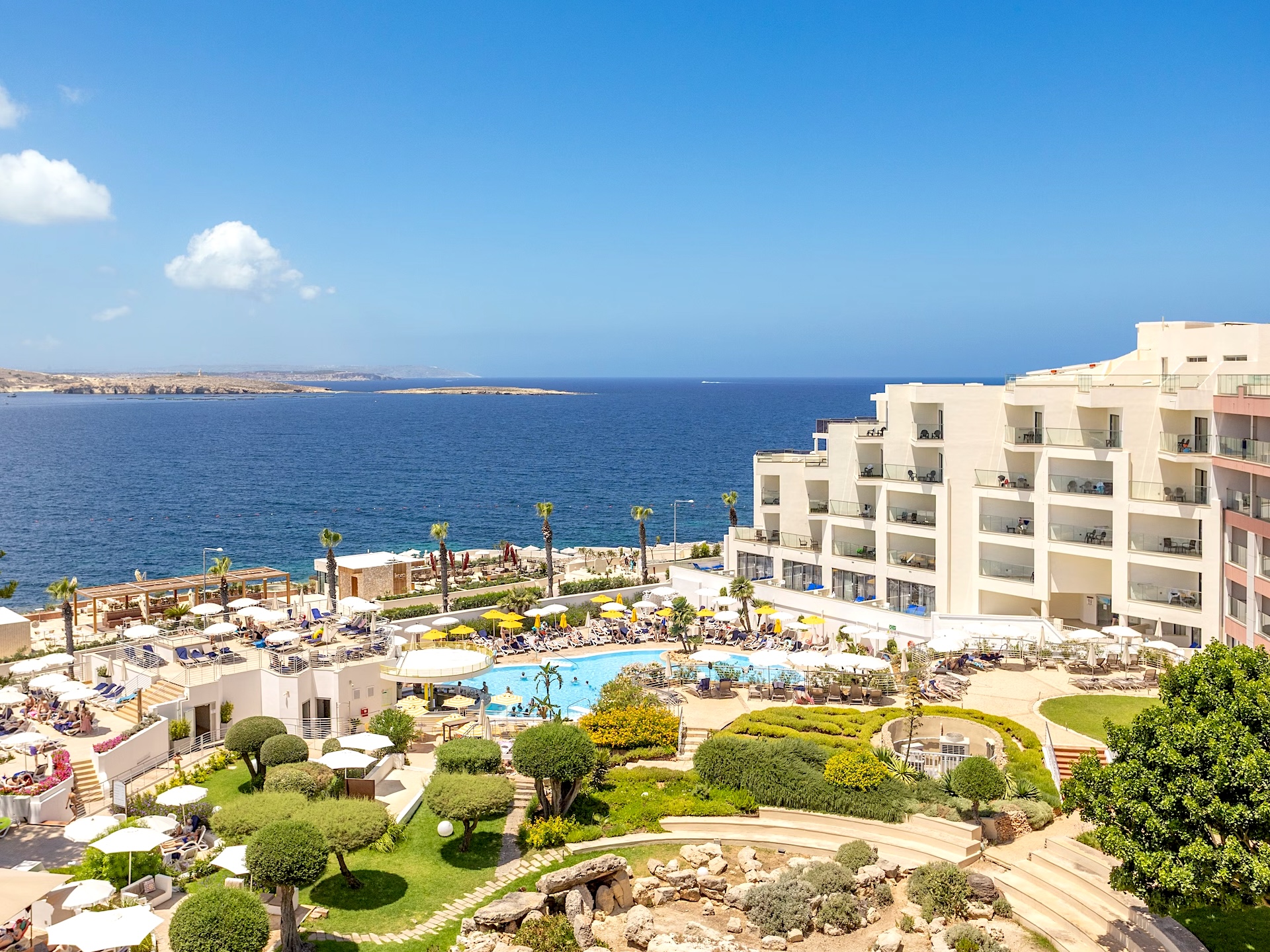 View of the pool and the sea at the DoubleTree by Hilton Malta