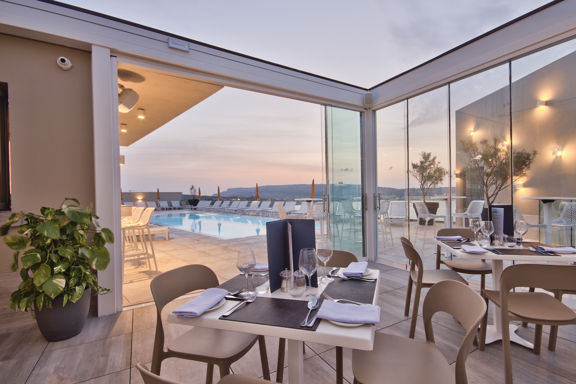View of the bar and rooftop pool at Luna Holiday Complex Malta