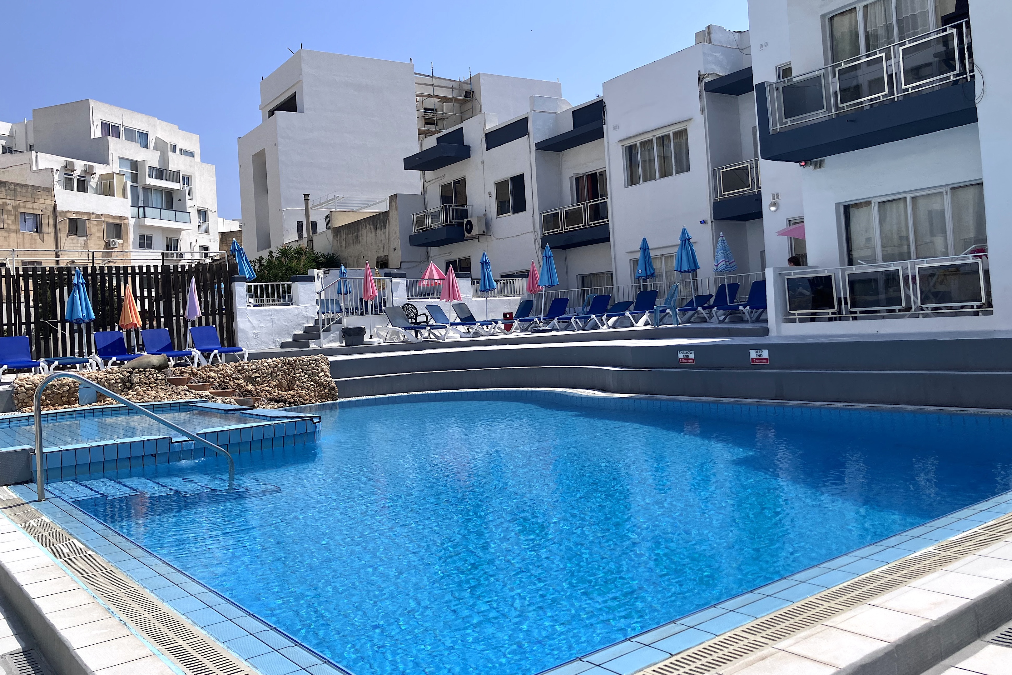 Clubclass swimming pool Clubclass campus swimming pool with sun loungers