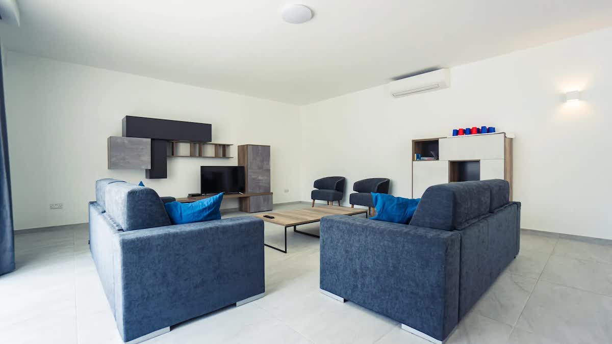 ESE Malta apartment Living room of a Claret apartment offered by ESE Malta