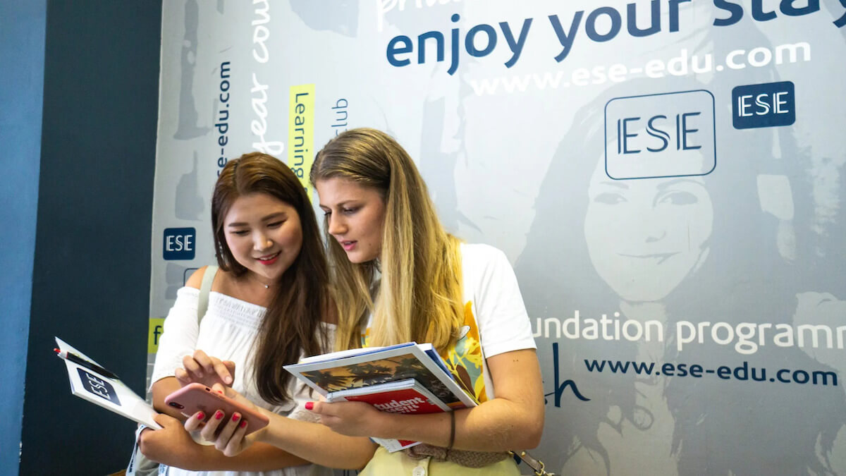 Students at ESE Malta Young adult ESE Malta students with their coursebooks