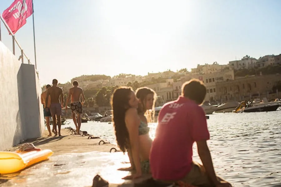 EF International Programme Young EF Malta students by the sea