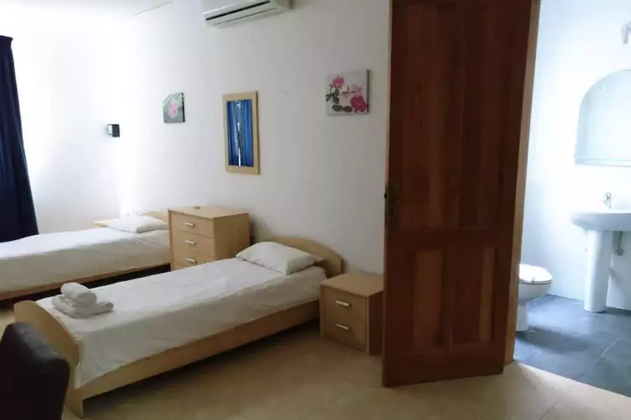 Quarto de um apartamento econômico da ESE