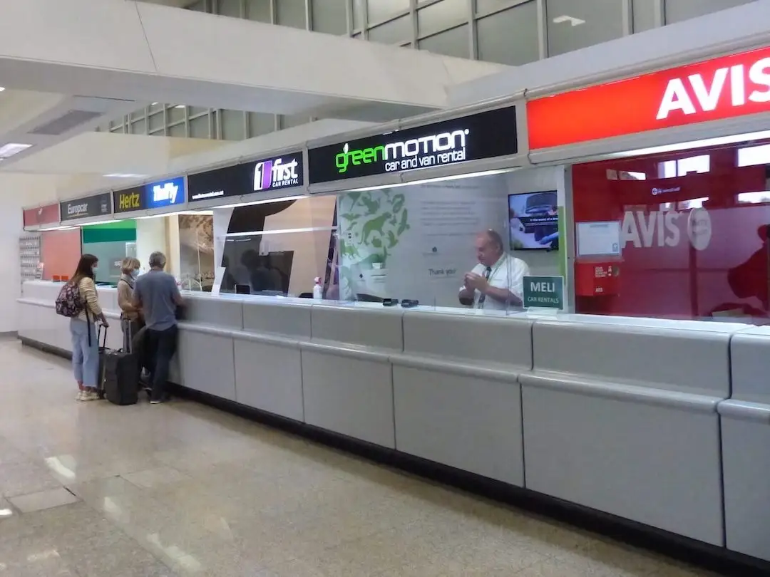 Row of car rental stands at Malta Airport