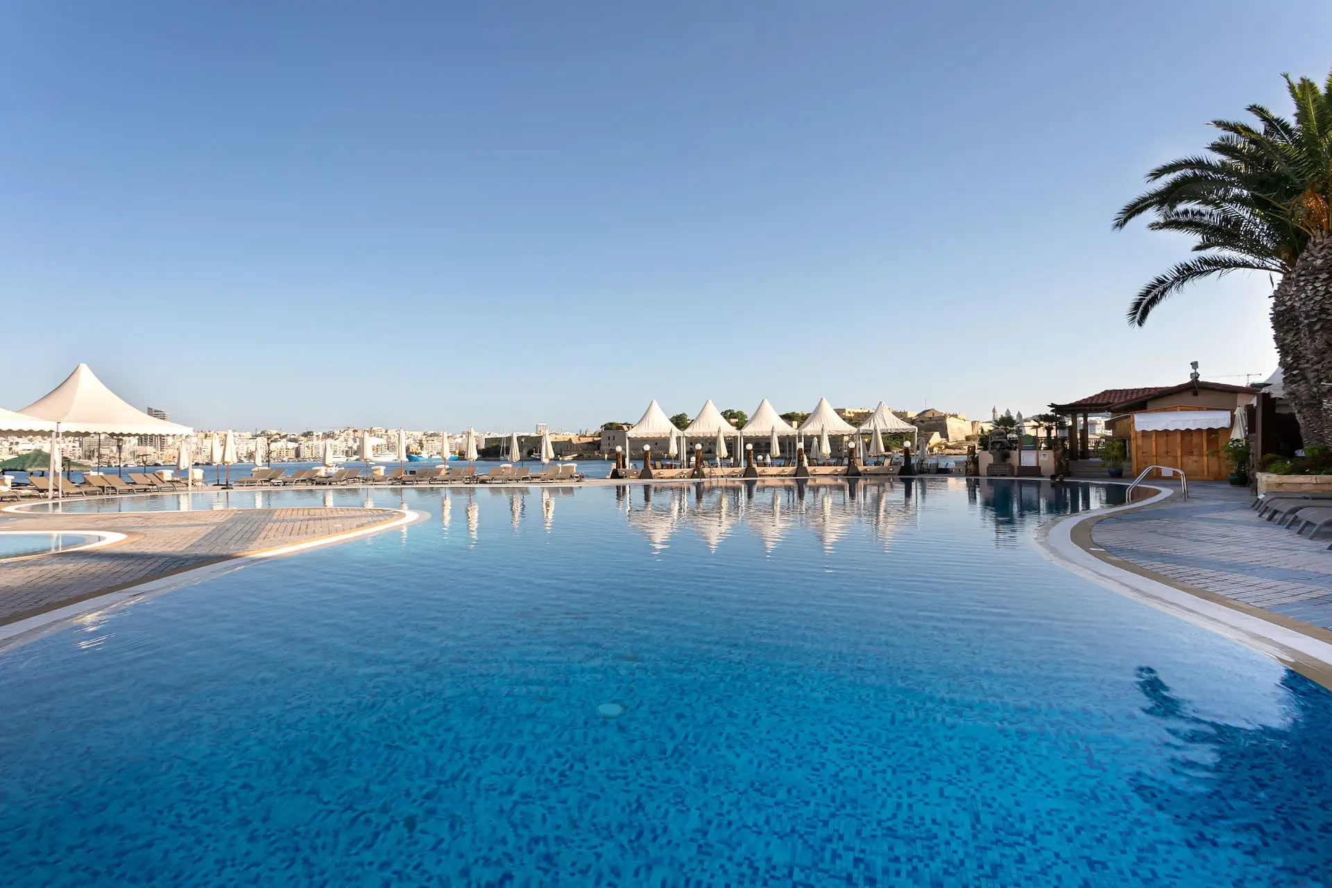 Outdoor pool with view over Marsamxett