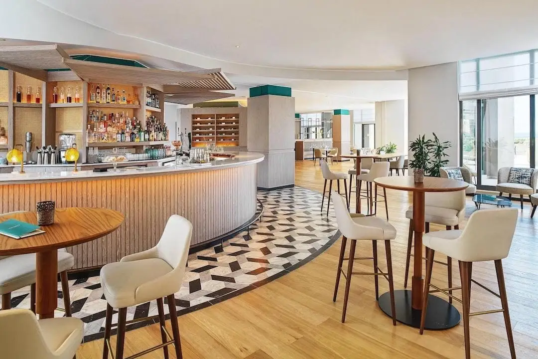 Bar with high tables and chairs Marriott Hotel Malta