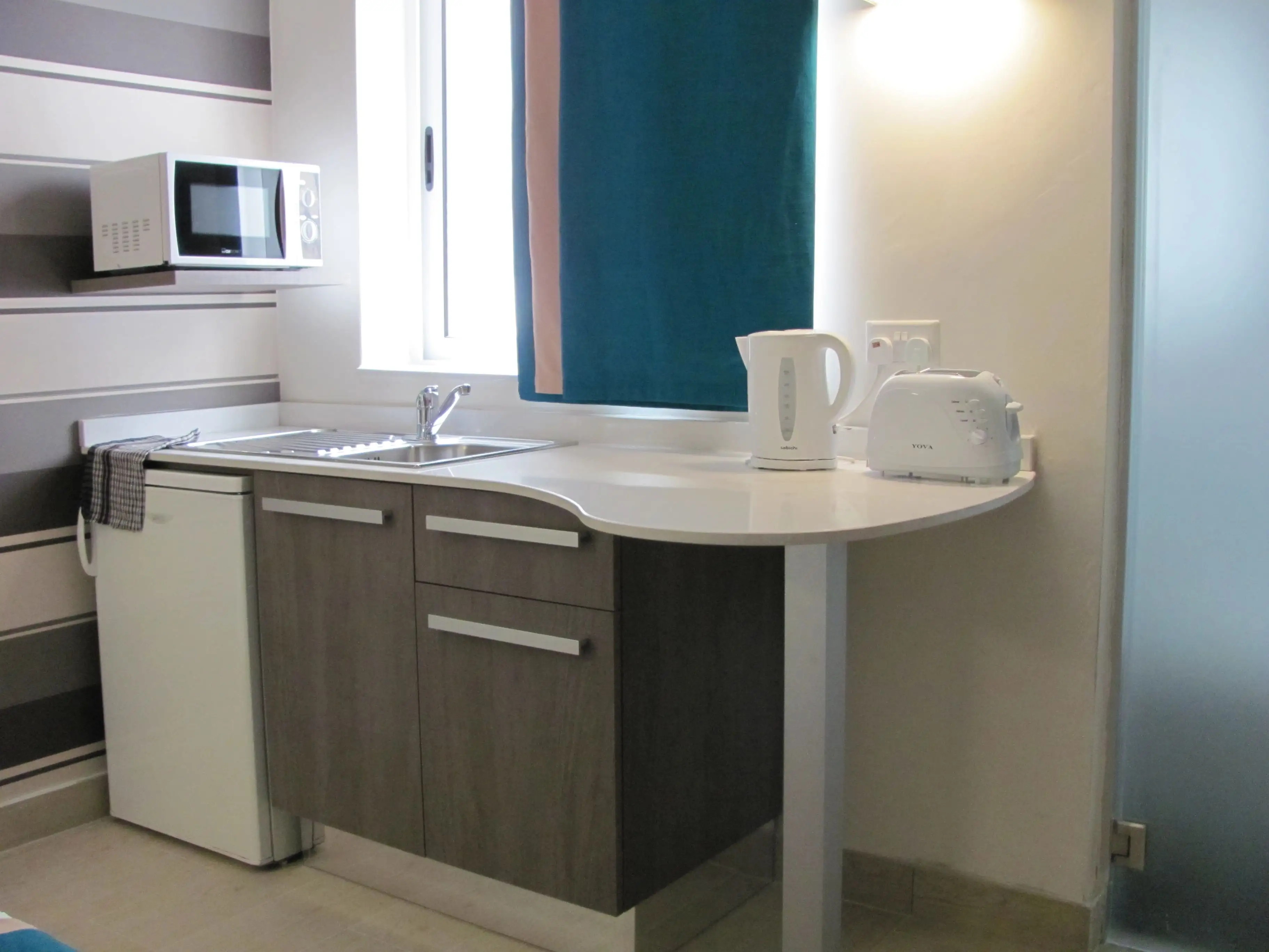 Fully equipped kitchenette in a Day's Inn studio
