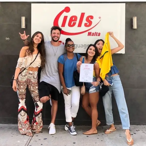Students in front of the IELS Malta sign