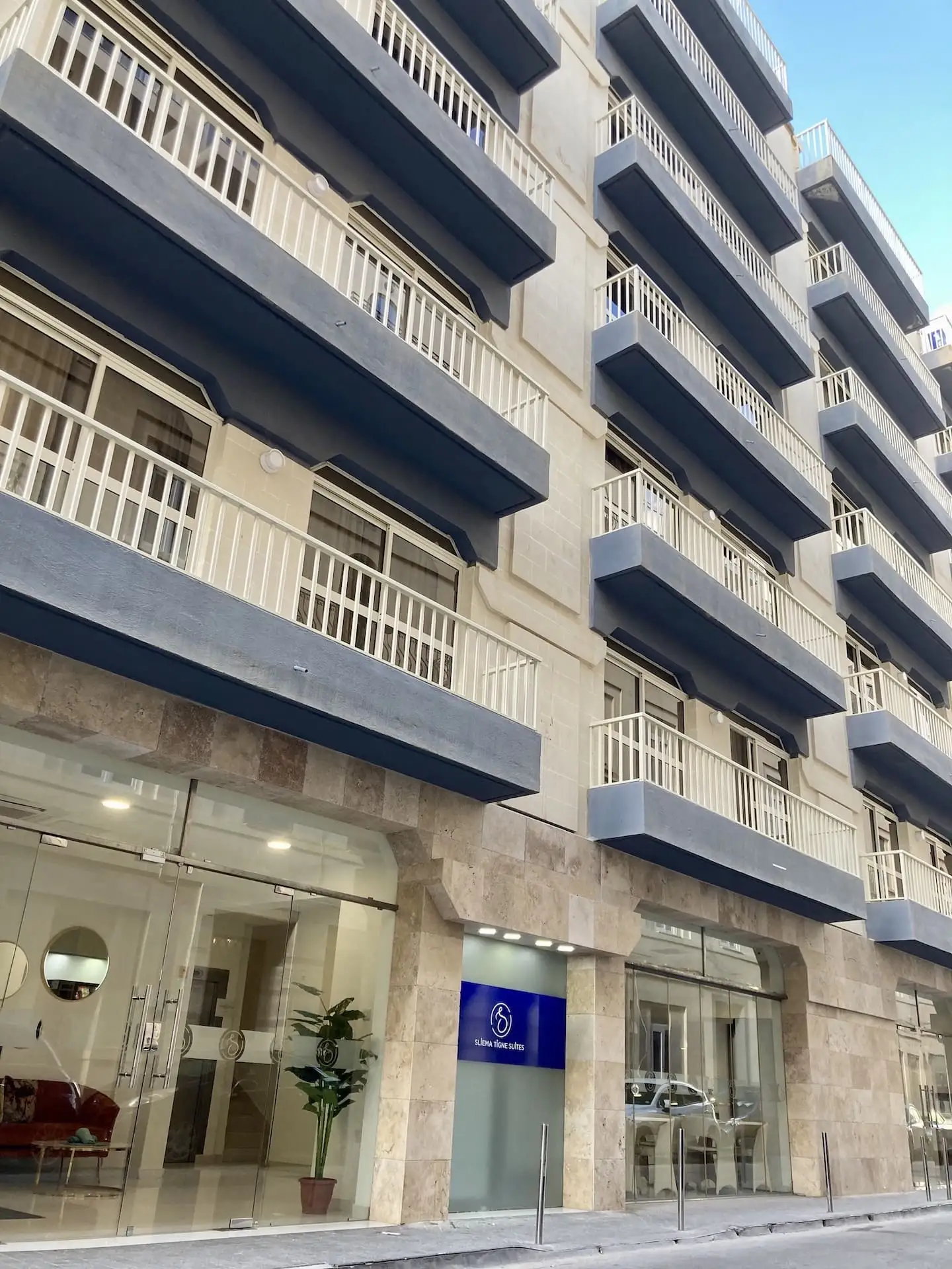 Modern facade of the Tigne Suites apartments in Sliema