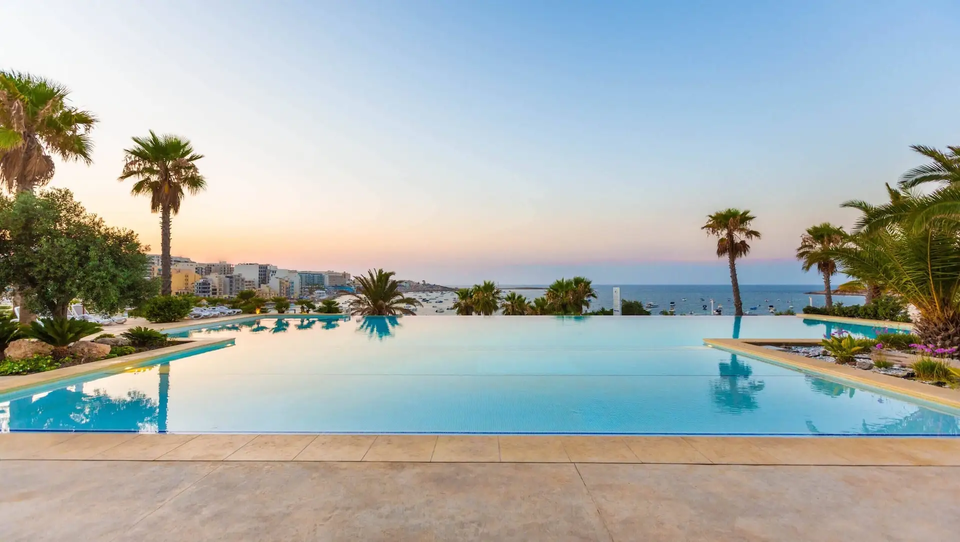 Outdoor pool with sea view at Salini Resort