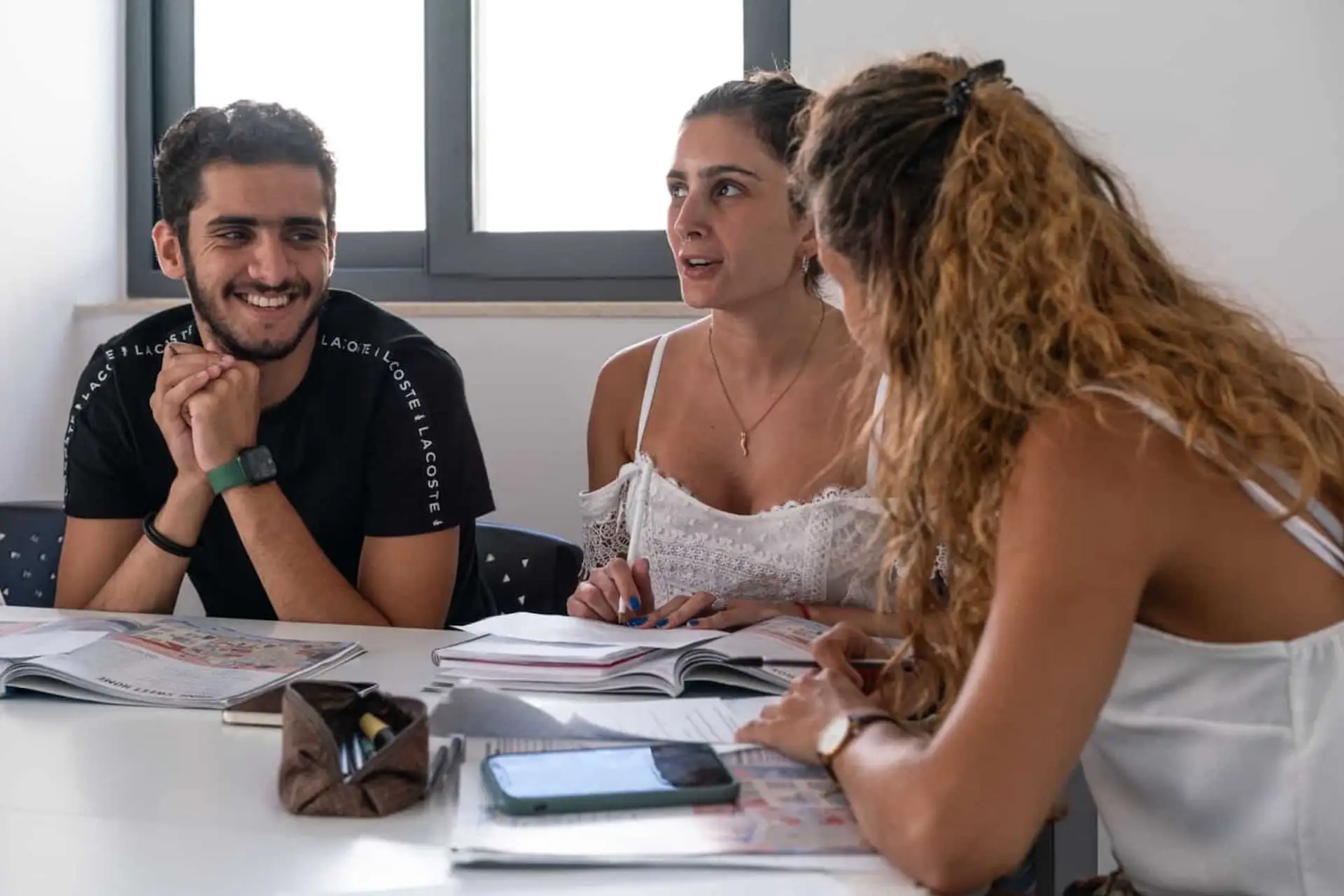 Students working together during an English class at EC Malta