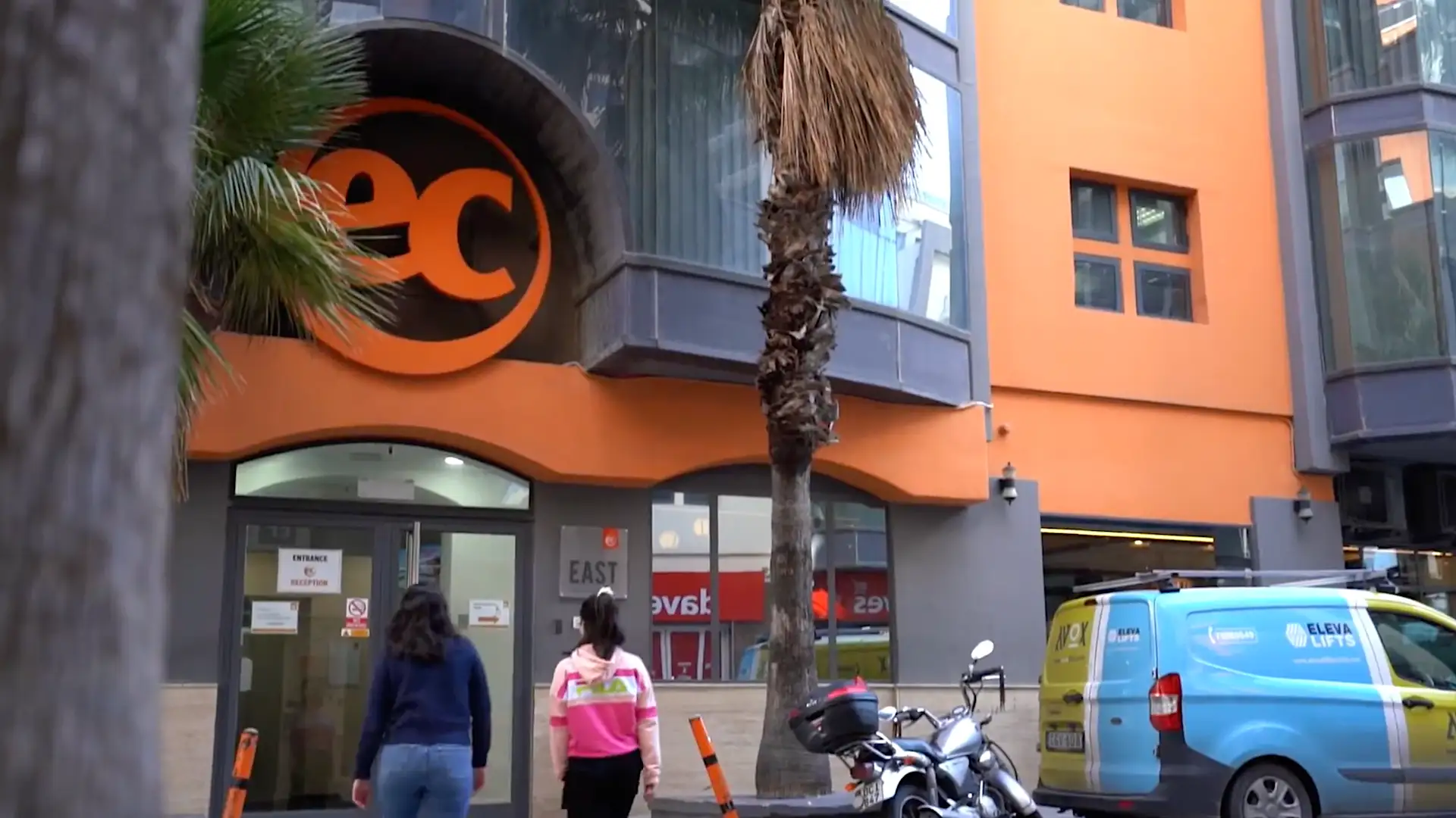 Two female students entering EC Malta