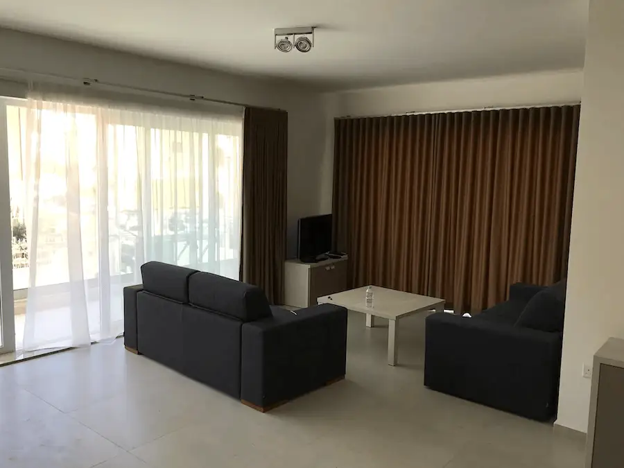 Living room of an Astolat shared apartment