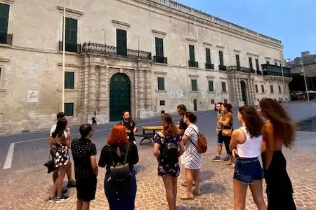 Group in front of a Valletta Malta monument