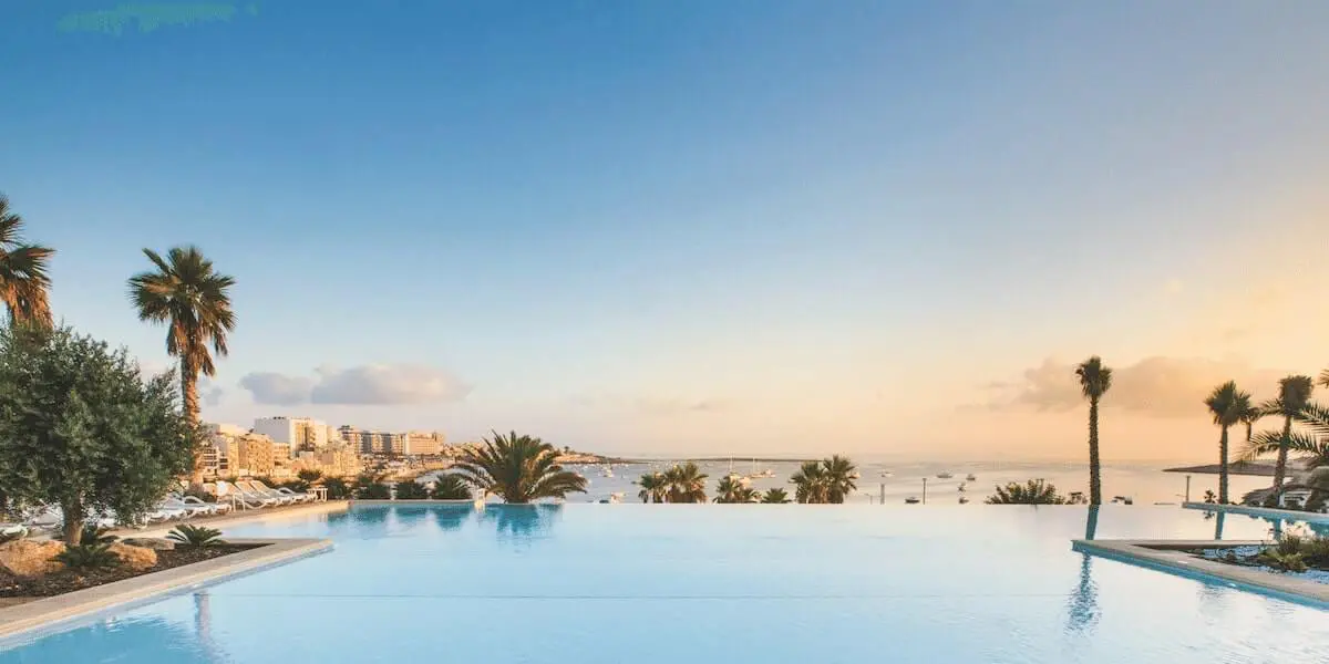 Swimming pool with sea view at Salini Resort Blog Malta